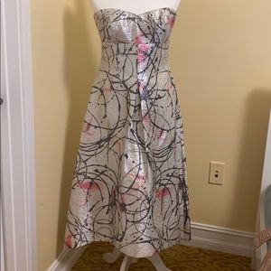 Very elegan silver dress. Size 6